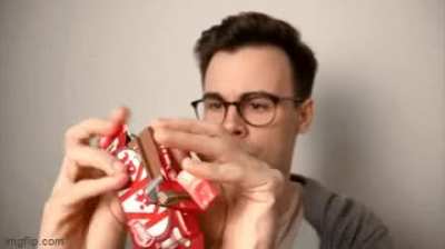 Eating kitkat!