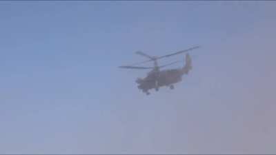 RU POV: The work of a Russian KA-52 Alligator with Mi-28 escort went on the attack, launching a volley of un-guided rockets to UAF positions 