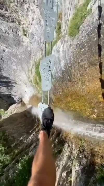 This person must be holding a guide rope, but I would literally get sweaty palms which would make me plunge to my death.
