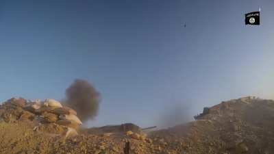 ISIS fighters attacking an Iraqi army barracks