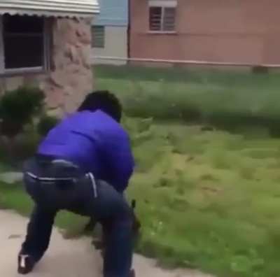 Guy gets attacked by dog and beats it up
