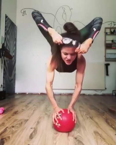 Her balance, strength and flexibility are off the charts