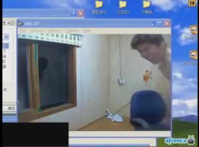 Crazy Korean guy smashes window while screaming bloody murder