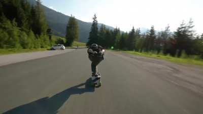Long boarding downhill at over 100 kph (60 mph)