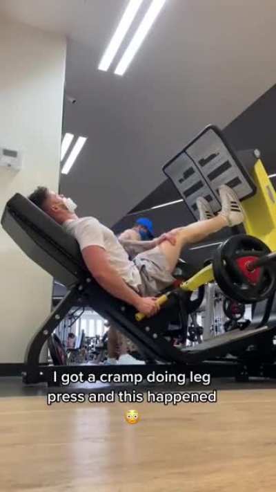 Just a guy helping another guy out at the gym