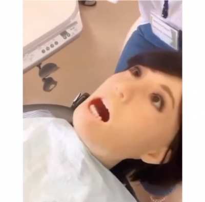 A malfunctioning dental school robot