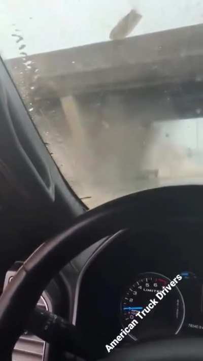 The moment a raised truck bed slams into an overpass