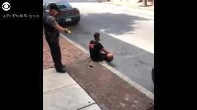 Cop tazers man