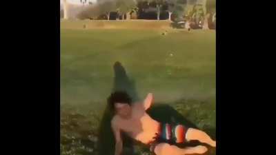 guy thinks it’s a good idea to run on wet grass