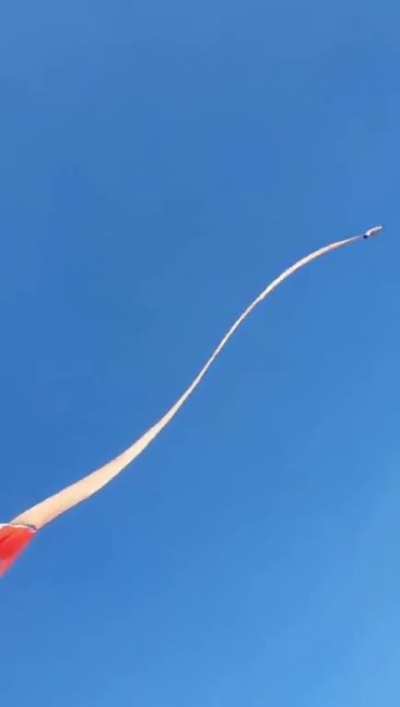 A 3 year old child got swept up with a kite.