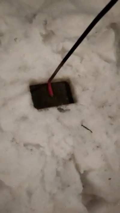 Red hot fire poker/ash scraper vs snow