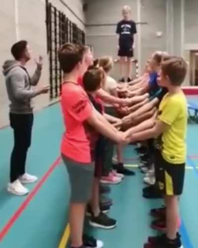 Kids try a trust exercise