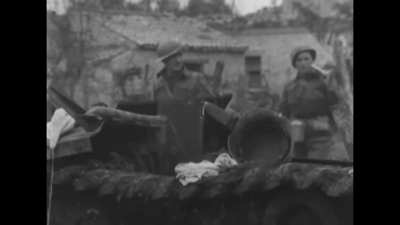 Canadian forces with a Panzer III Ausf. N and Panzer IV knocked out near Ortona in Italy in November 1944
