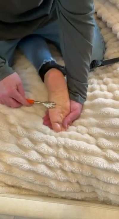 8 minutes of the wife strapped spread eagle and her bare feet tickled with fingers and tools. Torture for her!!!