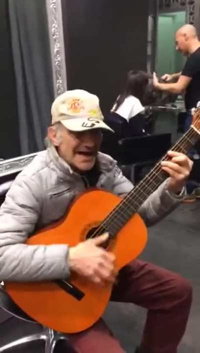 Old man plays the theme for 