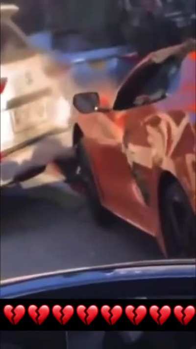 Driver looking backwards at his friend while flexing on public street ends up in crashing his car
