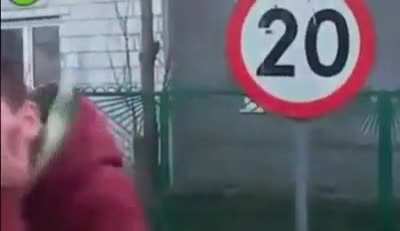 Dude hits an traffic sign