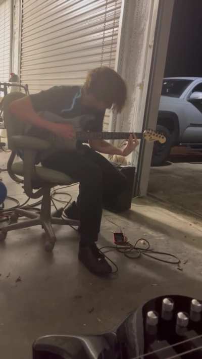 Me halfway drunk on my birthday jamming to Chevelle