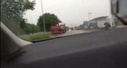 Greasy yob takes up the road then tosses bottle at approaching car. What could go wrong?