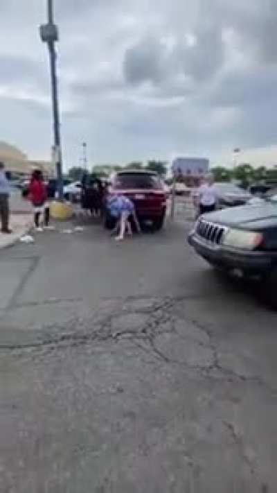 Parking lot battle royal featuring attempted vehicular homicide