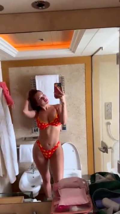 in orange bikini