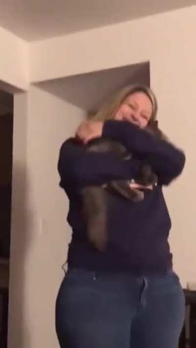 This kitty’s way of jumping into her human’s arms
