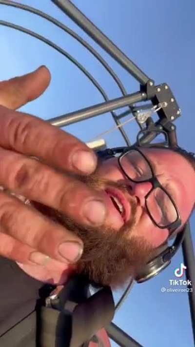 This man is up 6 thousand feet in the air with spare parts and an IPhone.