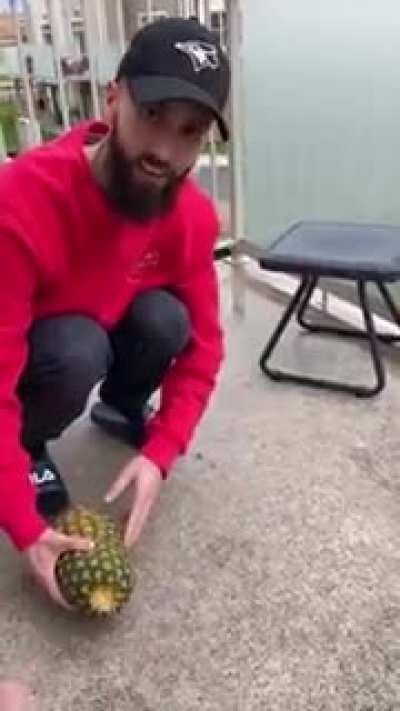 Opening up a pineapple