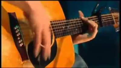 John Butler Playing 
