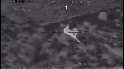 Retreating Taliban fighter gets shot in the leg and falls in a ditch, then is shot in the head by U.S Forces (Afghanistan unknown date)