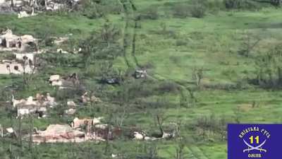 Ukrainian FPV drone attacks lone Russian tank, causing the crew to bail and stip naked