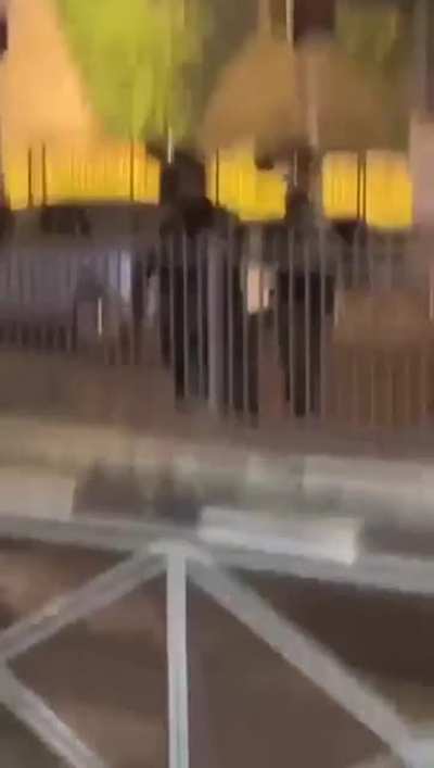 Soldier shooting a man filming directly