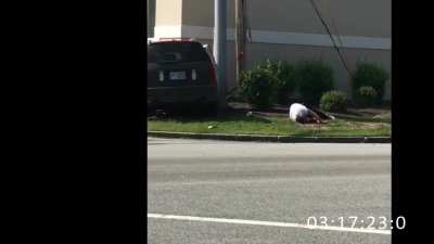 Cell phone footage shows man getting shot by police after chase