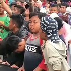 Kid stuck in the front row of a concert