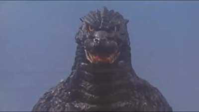 Godzilla making his way down town
