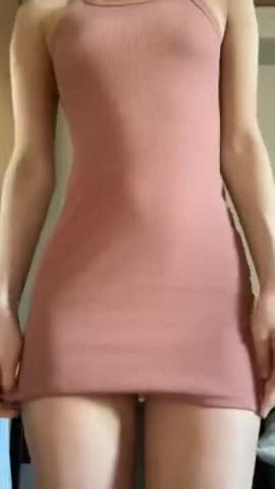 Stripping to show her tight little body