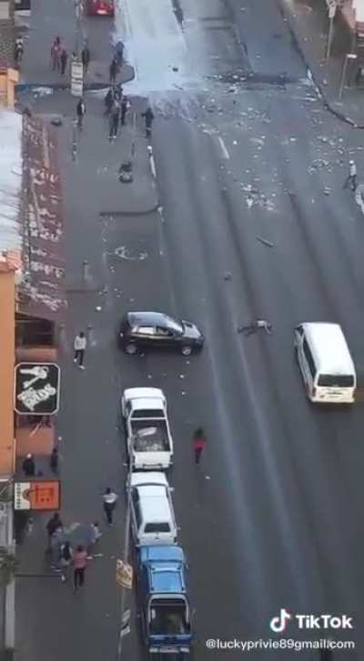 A looter in South Africa tries to rob a food delivery driver but instead gets run over