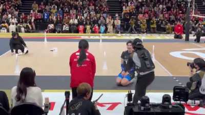 Volleyball player accidentally hits a judge.