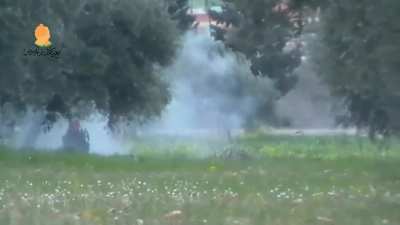 Opposition fighter with an RPG lies in wait to ambush a passing Syrian Army tank - Idlib - 4/10/2013