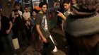 Man randomly punches in Crowd,gets what he desreves