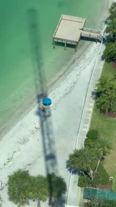 Crane operator purposely blocking the sun
