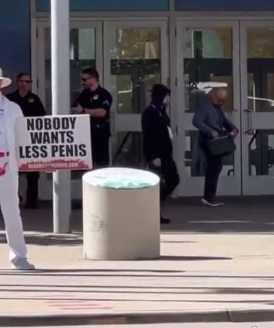 Blood Stained Men protest against circumcision at AAP conference