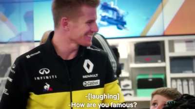 Formula 1 Renault driver, Nico Hulkenberg, gets destroyed by a group of kids