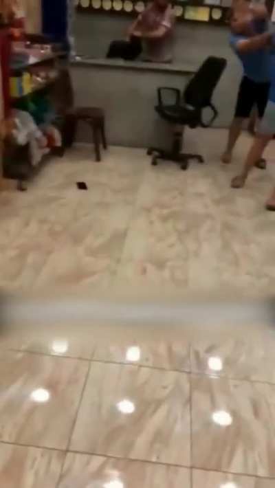 Fight Ensues after Phone Smacked Out of Hand with Sandal