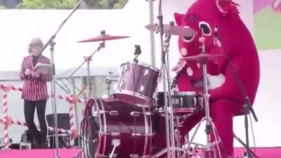 This guy's subtle drumming at a children's concert