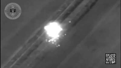Night-time footage of a Ukrainian FPV pilot attacking a Russian BM-21 