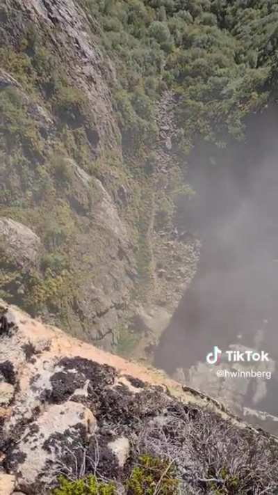 Norwegian safety worker removes a loose boulder