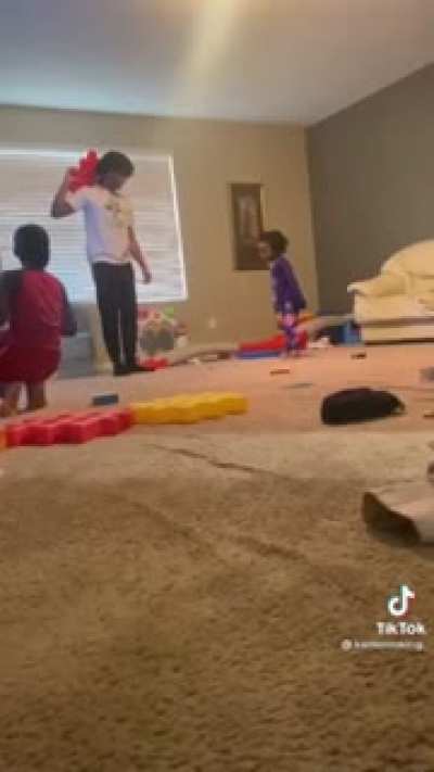 Absolute psychopath threatens younger brother with foam block