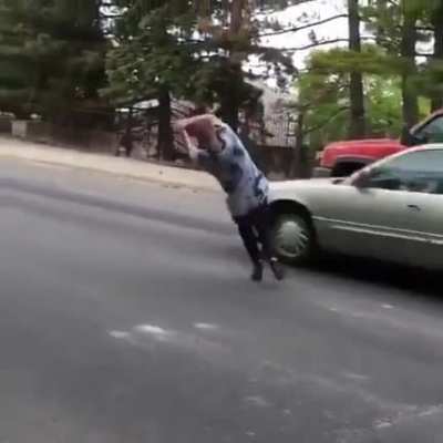Guy doing tricks on his skateboard