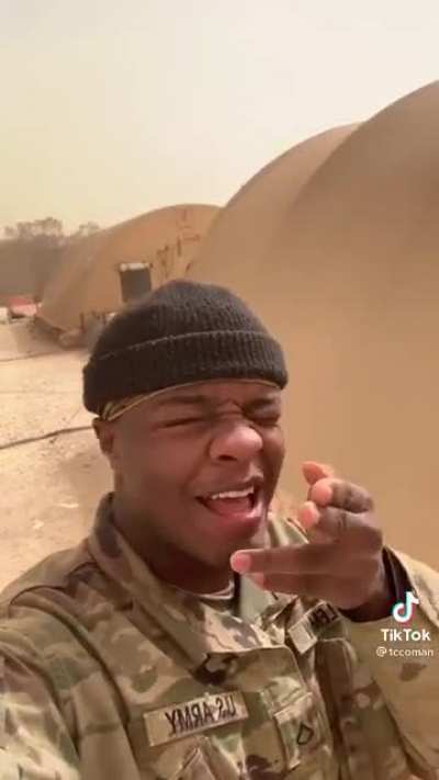 Soldier on deployment's first sandstorm.